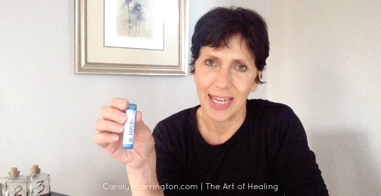 Carolyn Harrington holding a Natural Remedy