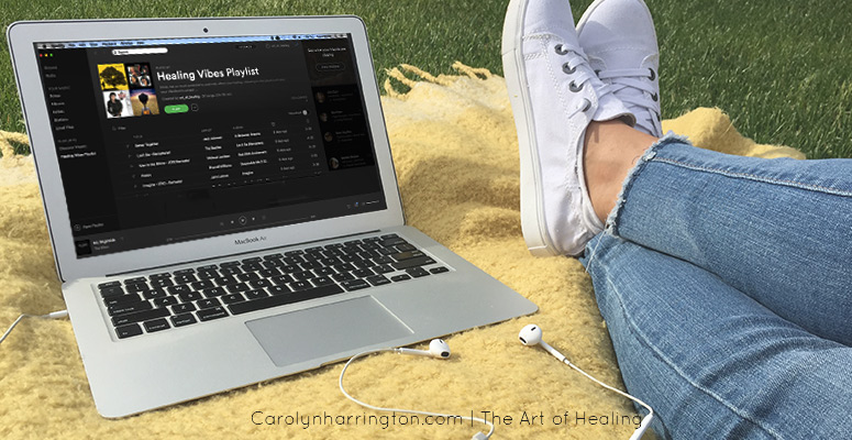 Playlist on Laptop outdoors
