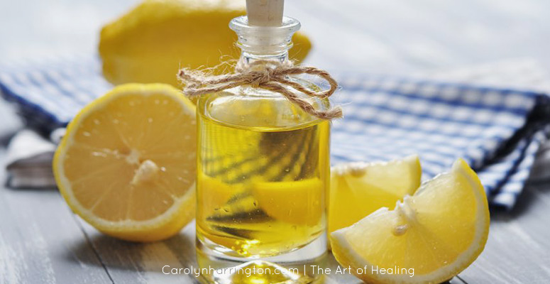 Bottle of Oil and Lemons